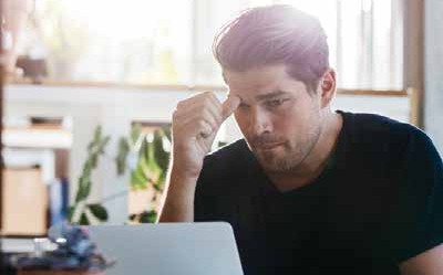 man working at computer