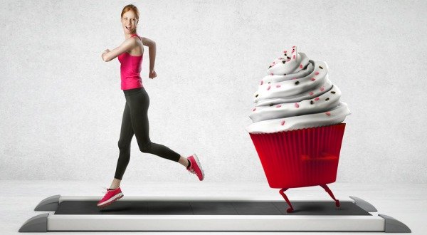 woman running away from a cupcake